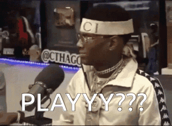 A Man Wearing A Gucci Headband Is Sitting In Front Of A Microphone And Says Playyy GIF