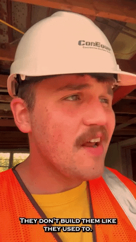 A Man Wearing A Hard Hat And Orange Vest Says They Don 'T Build Them Like They Used To GIF