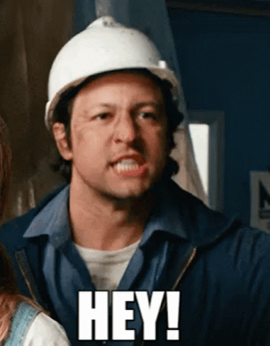 A Man Wearing A Hard Hat Says " Hey " GIF