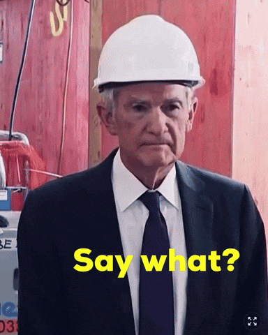 A Man Wearing A Hard Hat Says Say What GIF