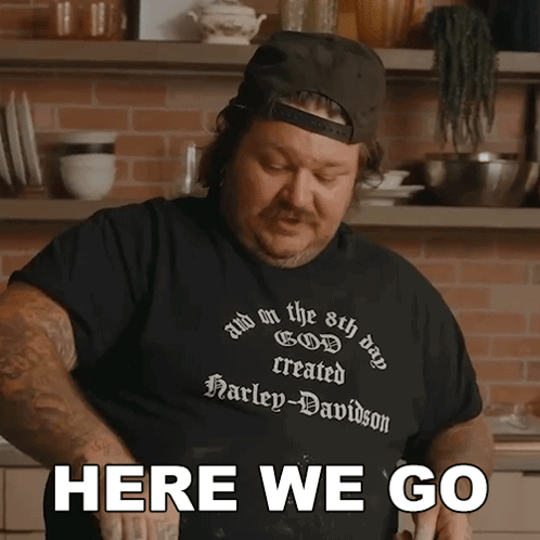 A Man Wearing A Harley Davidson T-Shirt Says " Here We Go " GIF