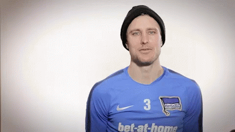 A Man Wearing A Hat And A Blue Jersey With The Number 3 On It GIF