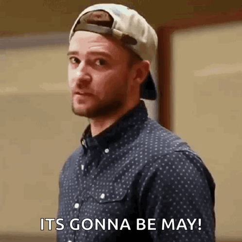 A Man Wearing A Hat And A Blue Shirt Says It 'S Gonna Be May GIF