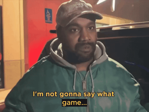 A Man Wearing A Hat And A Green Jacket Says " I 'M Not Gonna Say What Game " GIF