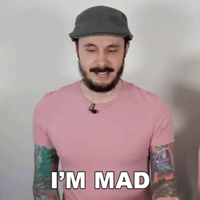 A Man Wearing A Hat And A Pink Shirt Is Saying I 'M Mad GIF