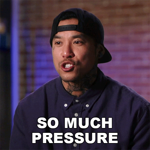 A Man Wearing A Hat And A Purple Shirt Says " So Much Pressure " GIF
