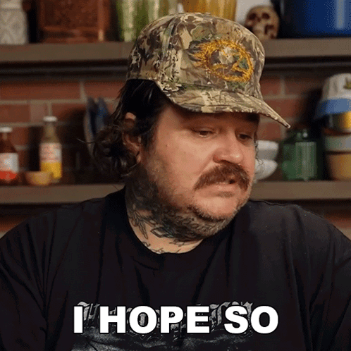 A Man Wearing A Hat And A Shirt That Says I Hope So GIF