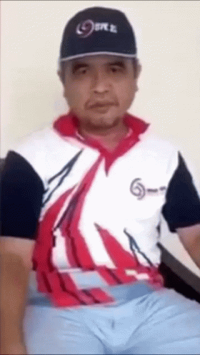A Man Wearing A Hat And A Shirt That Says Space GIF