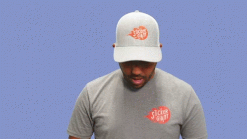 A Man Wearing A Hat And A Sticker Giant Shirt Says " Oh Lawd " GIF