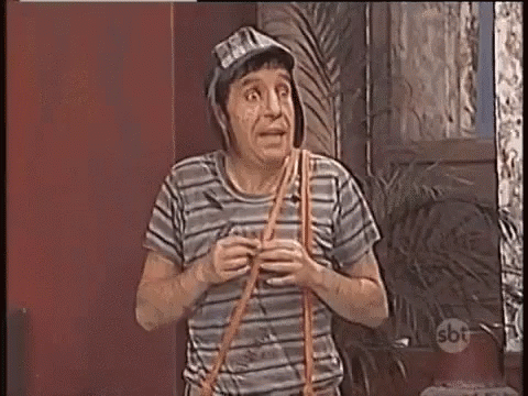 A Man Wearing A Hat And A Striped Shirt Is Holding A Rope In His Hand . GIF