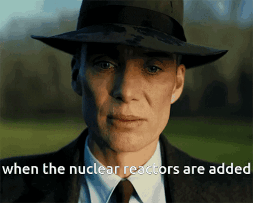 A Man Wearing A Hat And A Suit Says " When The Nuclear Reactors Are Added " GIF