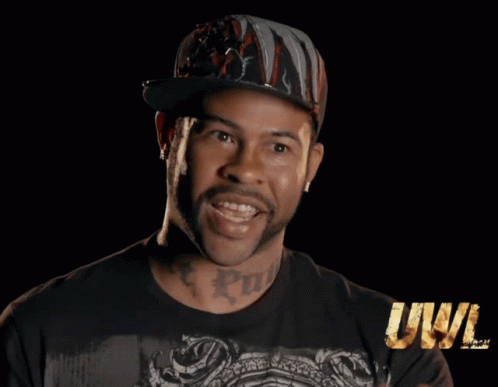 A Man Wearing A Hat And A T-Shirt That Says Jwa GIF
