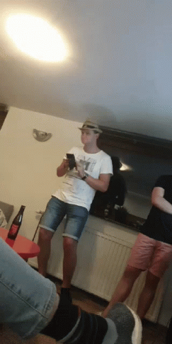 A Man Wearing A Hat And A T-Shirt That Says ' Y ' On It GIF