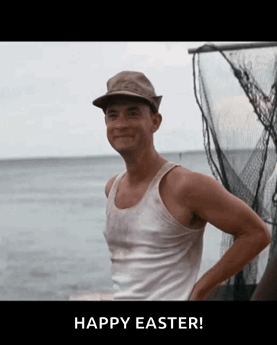 A Man Wearing A Hat And A Tank Top Is Standing In Front Of A Body Of Water And Says Happy Easter GIF