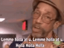 A Man Wearing A Hat And Glasses Is Saying Lemme Holla At U . GIF