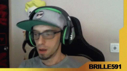 A Man Wearing A Hat And Headphones With The Name Brille591 On The Bottom Right GIF