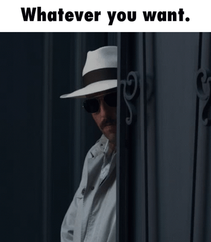 A Man Wearing A Hat And Sunglasses Is Peeking Out From Behind A Door With The Words " Whatever You Want " Above Him GIF