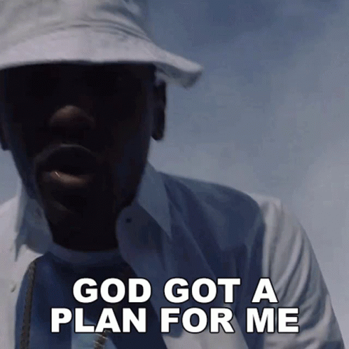 A Man Wearing A Hat And Tie Is Saying God Got A Plan For Me GIF
