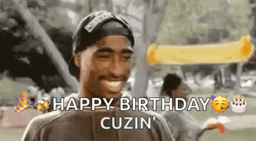 A Man Wearing A Hat Is Laughing And Saying Happy Birthday Cuzin . GIF