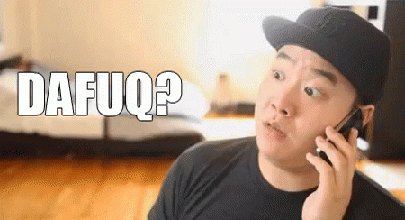 A Man Wearing A Hat Is Talking On A Cell Phone And The Word Dafuq Is Visible In The Background . GIF