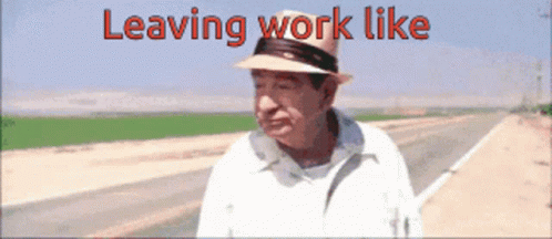 A Man Wearing A Hat Is Walking Down A Road With The Words Leaving Work Like Written Above Him GIF