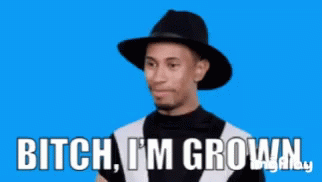 A Man Wearing A Hat Says Bitch I 'M Grown On A Blue Background GIF