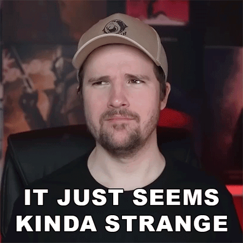 A Man Wearing A Hat Says " It Just Seems Kinda Strange " On The Bottom GIF