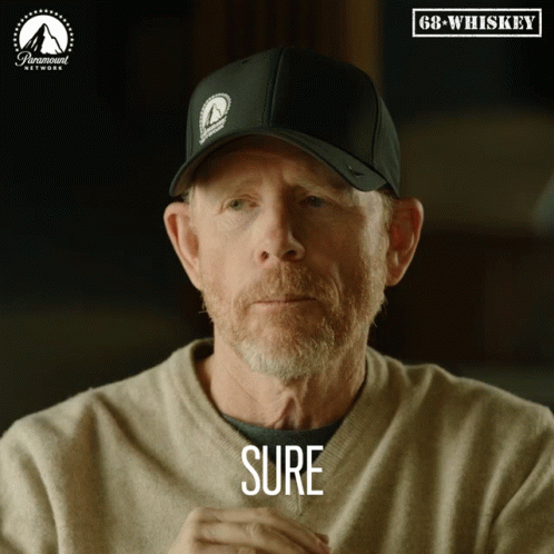 Man In Hat Saying Sure In Front Of Paramount Logo GIF