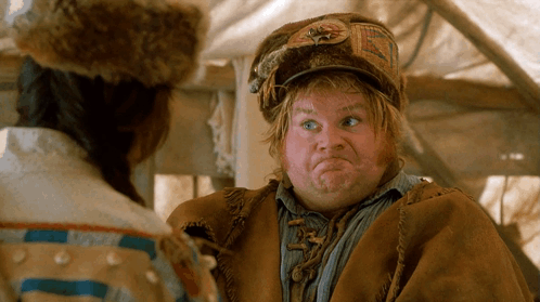A Man Wearing A Hat That Says ' Eagle ' On It Is Making A Funny Face GIF