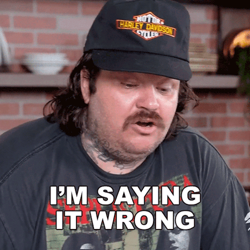 A Man Wearing A Hat That Says Harley Davidson Cycles Is Saying I 'M Saying It Wrong GIF