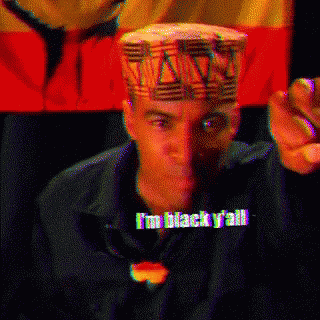 a man wearing a hat that says i 'm black y'all on it