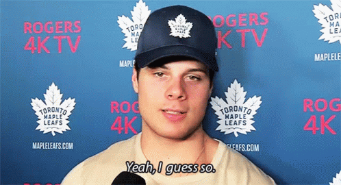 A Man Wearing A Hat That Says Toronto Maple Leafs On It GIF