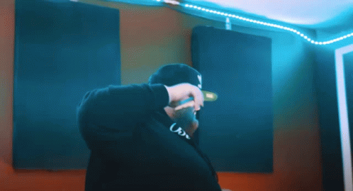 A Man Wearing A Hat That Says Us On It GIF