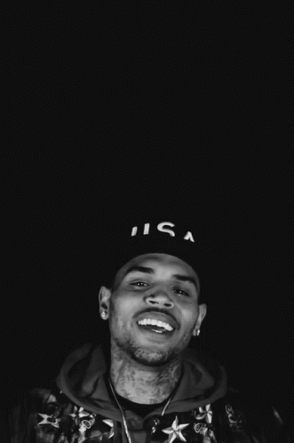 A Man Wearing A Hat That Says Usa On It GIF