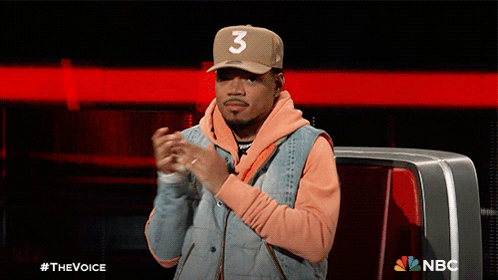A Man Wearing A Hat With The Number 3 On It Applauds GIF