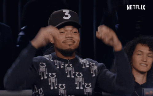 A Man Wearing A Hat With The Number Three On It GIF