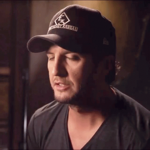 A Man Wearing A Hat With The Words Pretty Special On It GIF