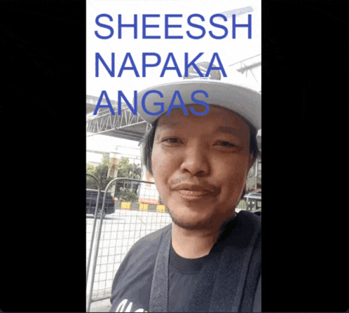 A Man Wearing A Hat With The Words Sheessh Naka Angas Written On It GIF