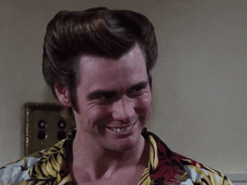 A Man Wearing A Hawaiian Shirt Is Crying GIF
