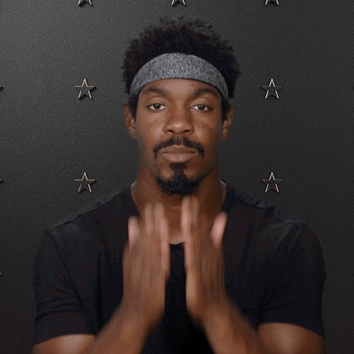 Man Wearing Headband And Black Shirt Says I Love You GIF