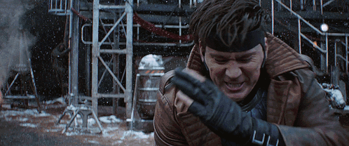 A Man Wearing A Headband And Gloves With The Letters Ll On Them GIF