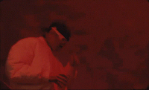 A Man Wearing A Headband That Says ' A ' On It GIF