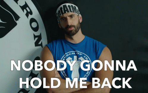 A Man Wearing A Headband That Says Iron On It GIF