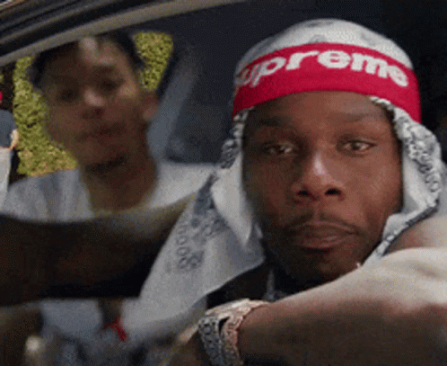 A Man Wearing A Headband That Says Supreme GIF