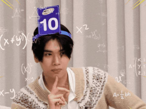 A Man Wearing A Headband With The Number 10 On Top GIF