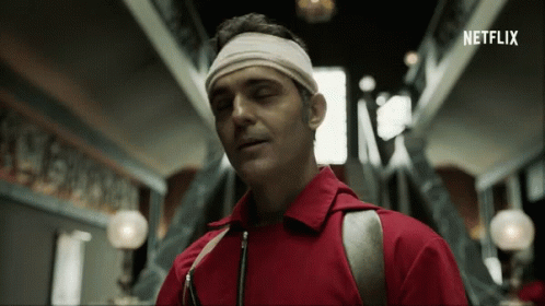 A Man Wearing A Headband With The Word Netflix Written On It GIF