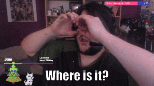 A Man Wearing A Headset Is Making A Heart With His Hands And The Words Where Is It GIF