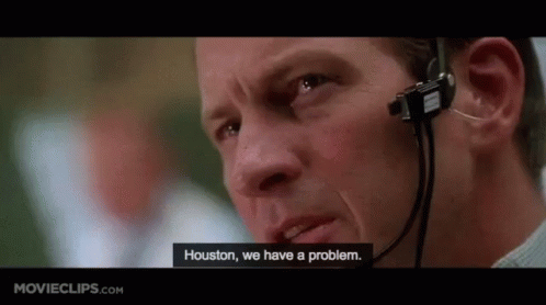 A Man Wearing A Headset Is Talking On A Phone . GIF