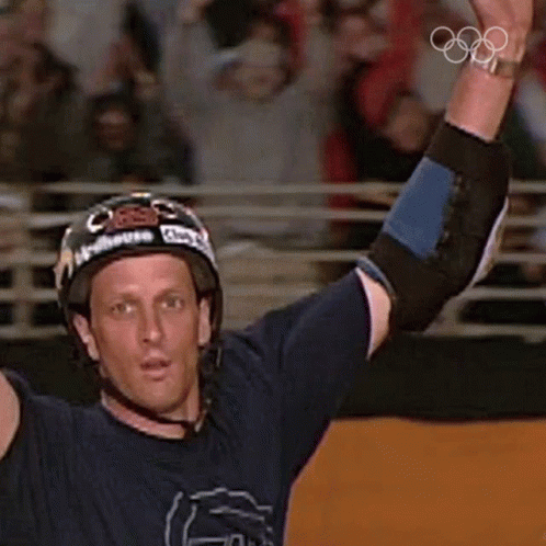 A Man Wearing A Helmet And A Furs Shirt GIF