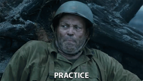 A Man Wearing A Helmet And A Green Jacket Has The Word Practice On His Chest GIF
